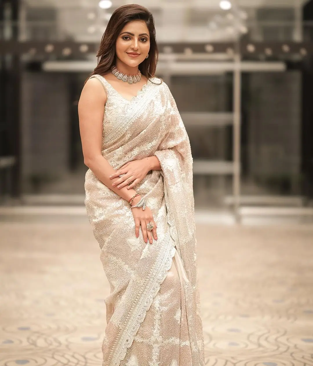 Athulya Ravi in Beautiful Earrings Jewellery White Designer Saree Sleeveless Blouse